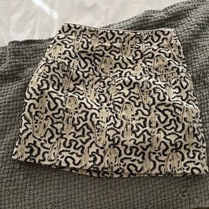 Fun pencil skirt with chita and gold print